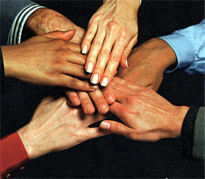 Hands working together
